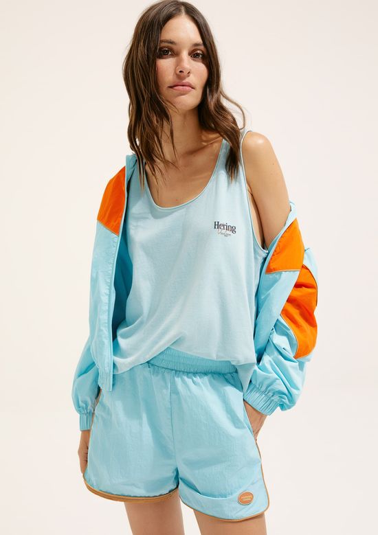 Foto do produto: Regata Alongada Com Estampa Hering + Cosmo - Azul