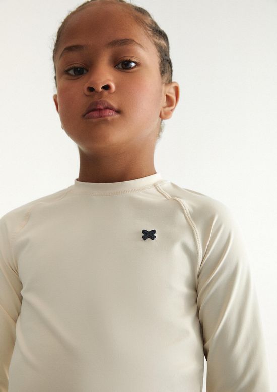 Foto do produto: Camiseta Infantil Unissex Manga Longa Com Proteção Solar - Creme