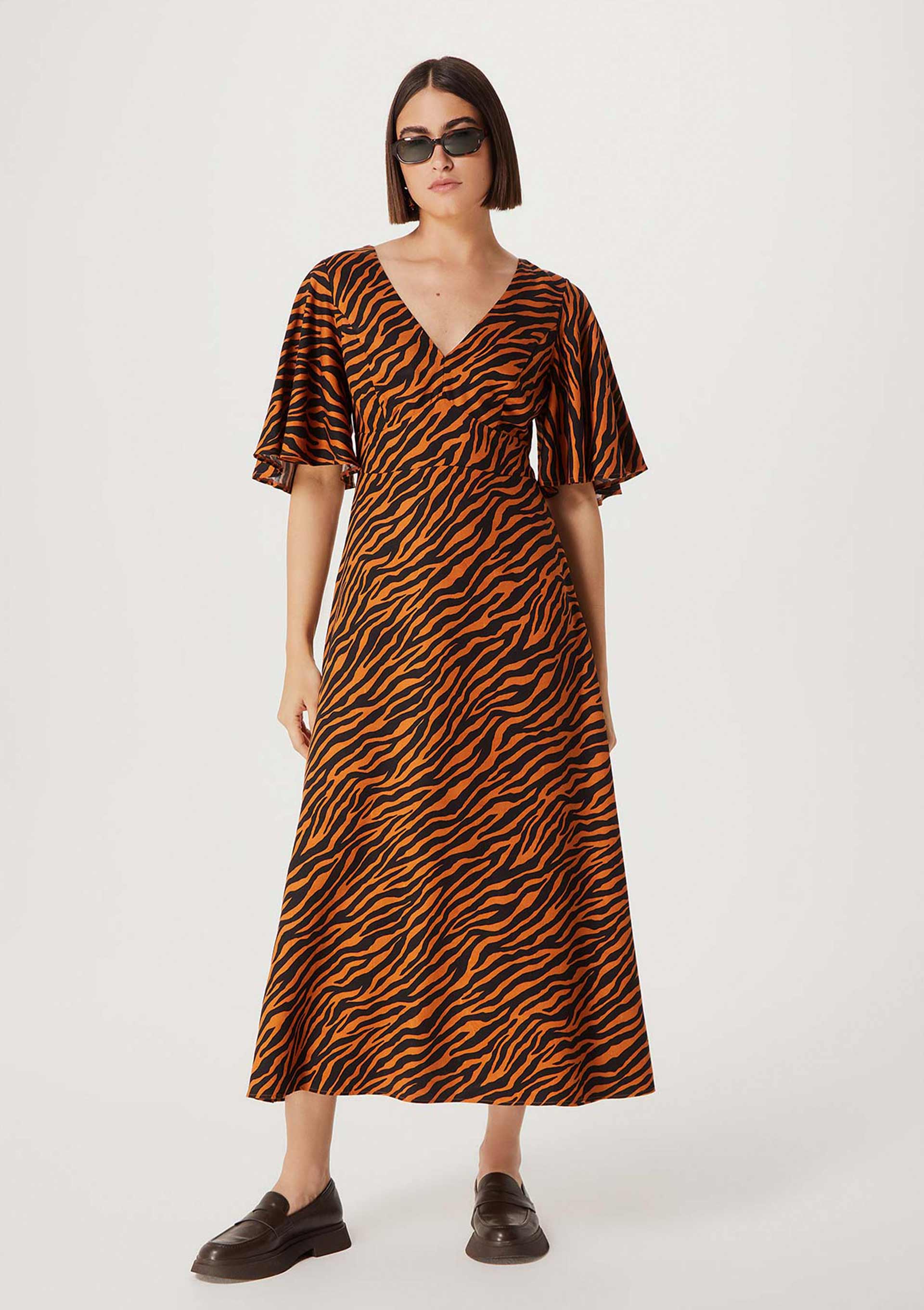 Vestido midi hot sale animal print